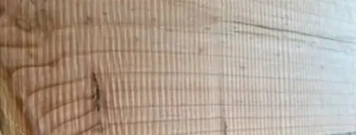 Rough cut edge from a bandsaw in wood