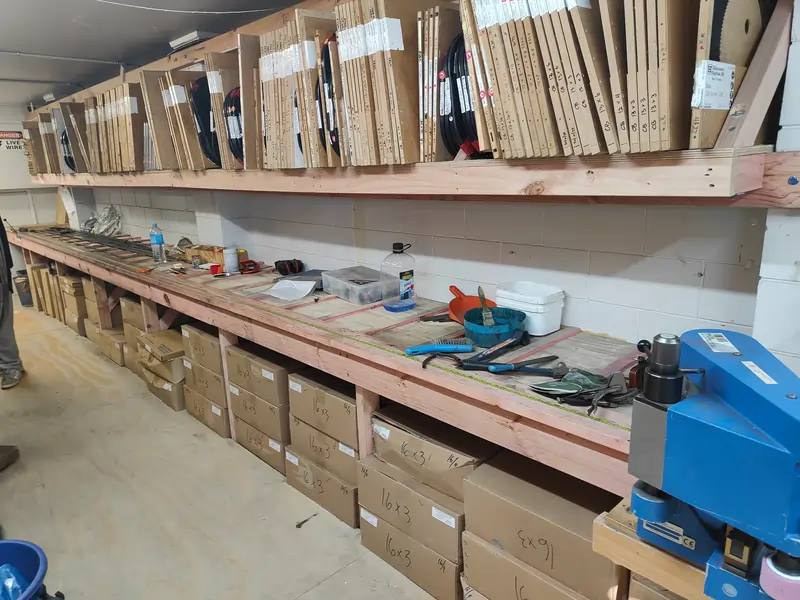 Bandsaw blade production area with carbon and meat blade inventory supporting fast NZ manufacturing and industrial supply