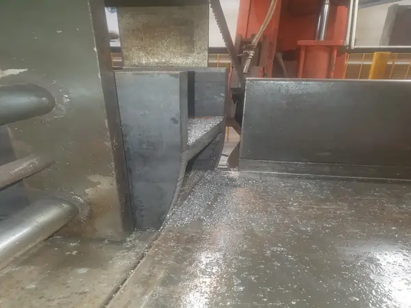 Structural steel bandsaw cutting problem caused by material movement and blade wandering